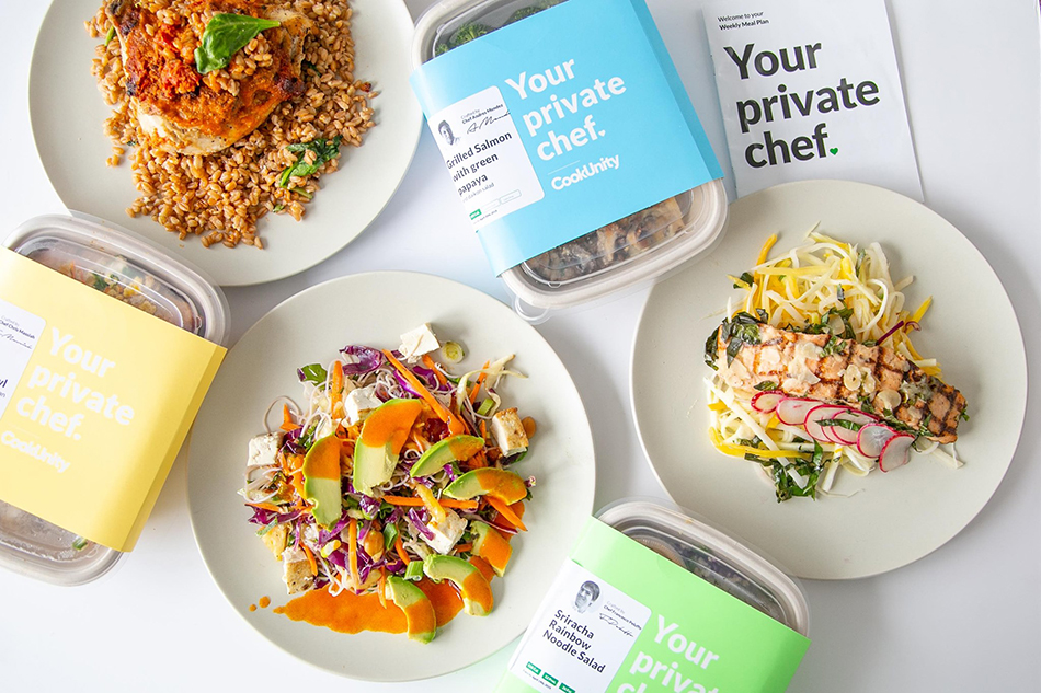 Cookunity food and packaging on a table - promo code